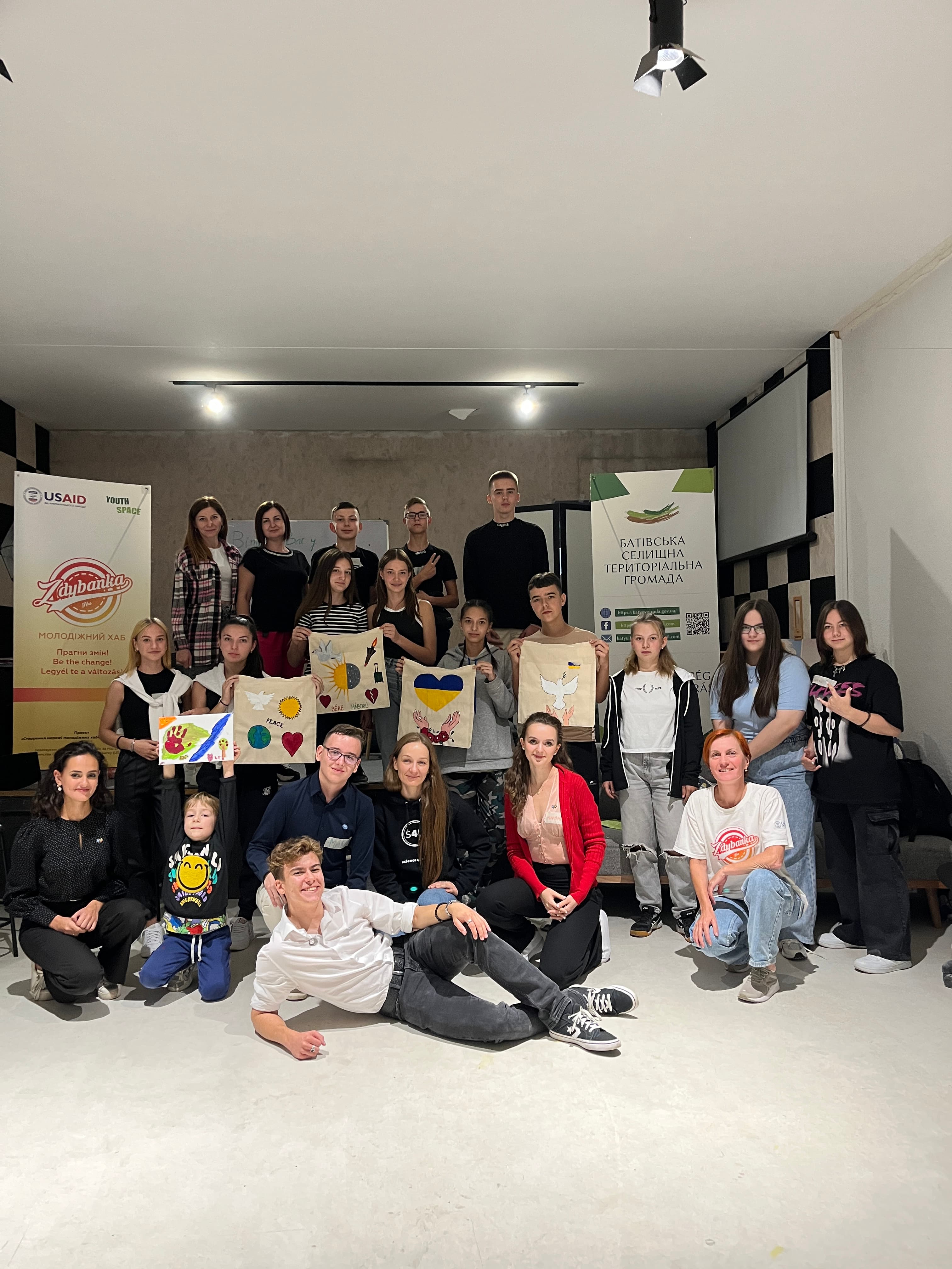 Young people collaborating on artwork