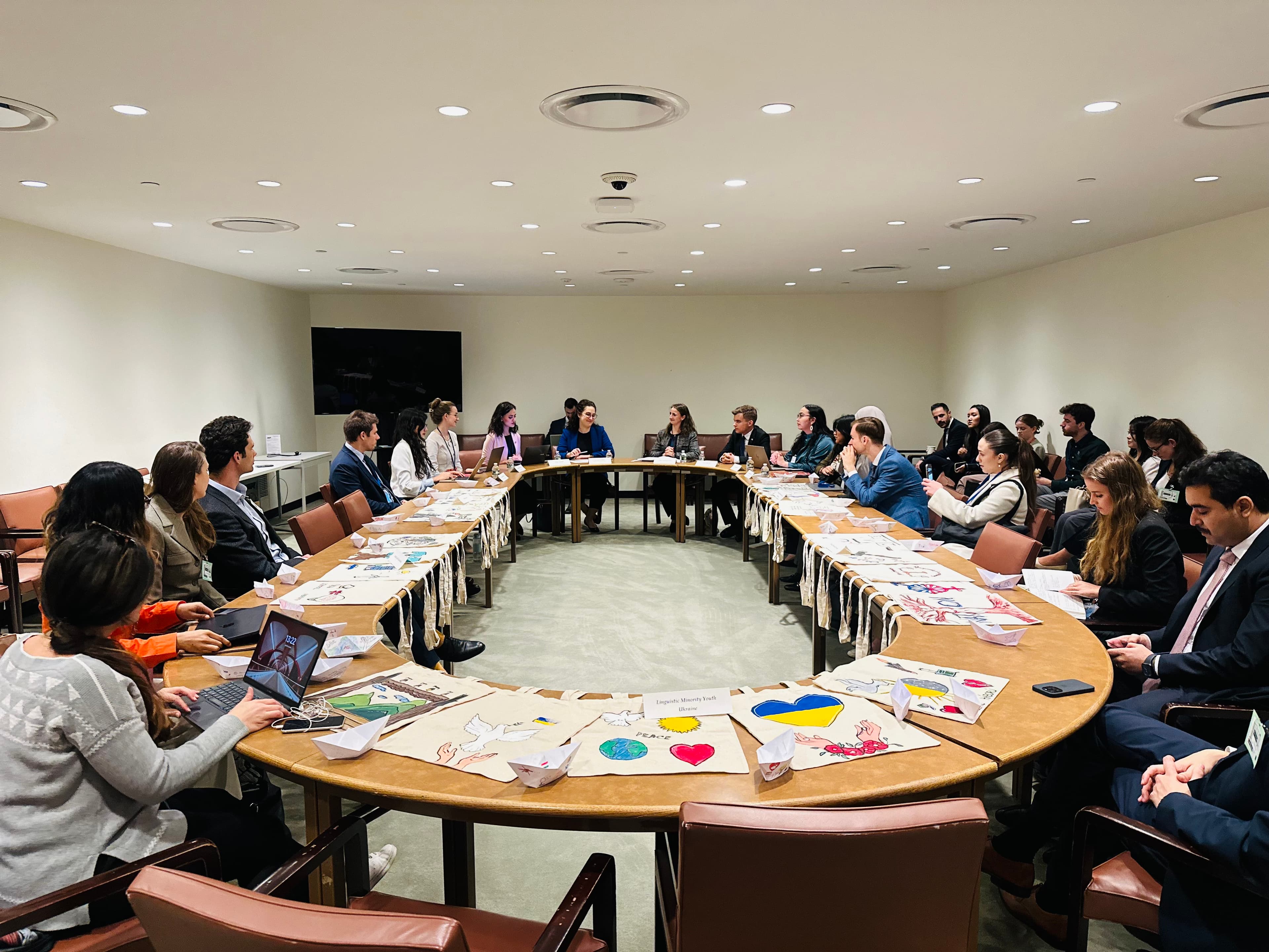 Painted canvas bags showing doves and Ukrainian symbols