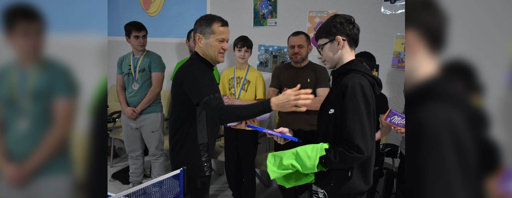 Professor Krausz handing out prizes to young participants